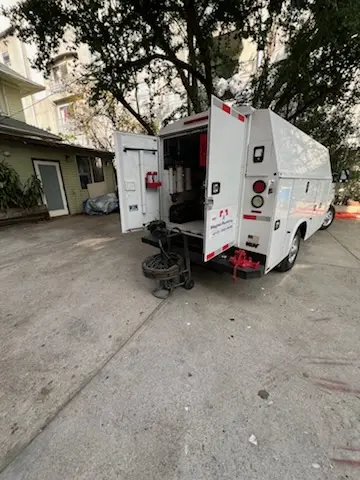 Magnet Plumbing service vehicle on-site for Grease Trap Cleaning in Lake Nona South